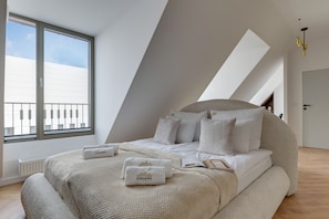 Deluxe Studio, River View | Living area | Flat-screen TV