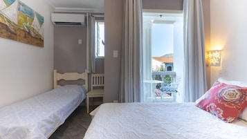 Habitación con 2 camas individuales, balcón | Caja fuerte y wifi gratis