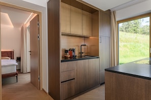 Kondominium Superior, pemandangan kebun | Dapur pribadi | Lemari es, oven, kompor, dan mesin pencuci piring