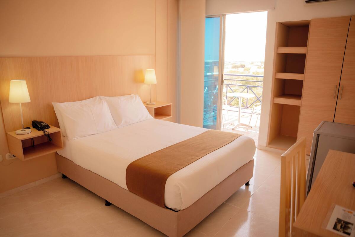 Desk, laptop workspace, free WiFi, bed sheets