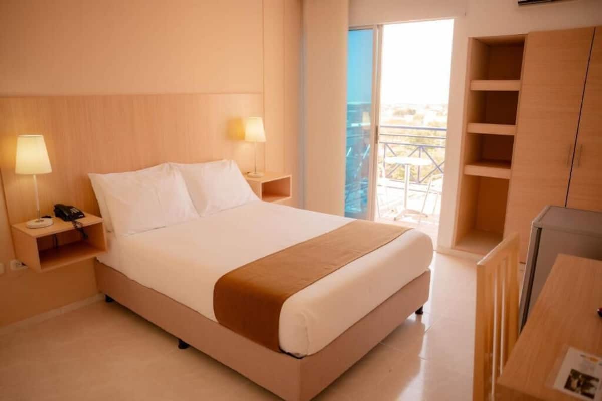 Superior Double Room, Balcony, Courtyard View | Desk, laptop workspace, free WiFi, bed sheets