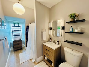 Hair dryer, towels, soap, toilet paper