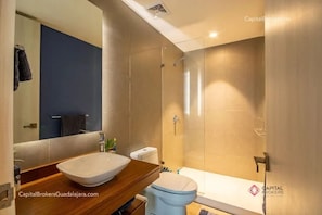 Family Apartment, Balcony, Garden View | Bathroom | Combined shower/tub, hair dryer, towels, soap