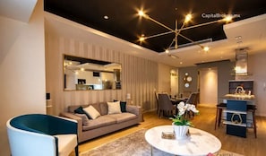 Family Apartment, Balcony, Garden View | Living area