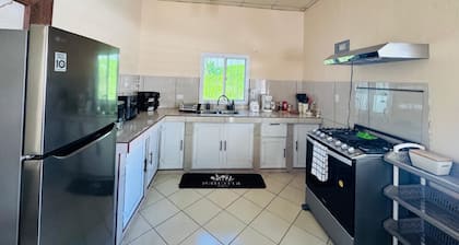 Cozy 2-bedroom house in welcoming Puerto Barrios with AC