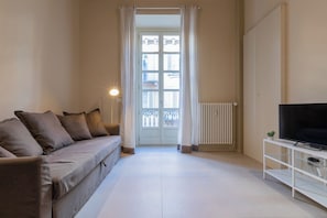 Apartment, 1 Double Bed with Sofa bed, Balcony | Living area | 30-inch TV with satellite channels