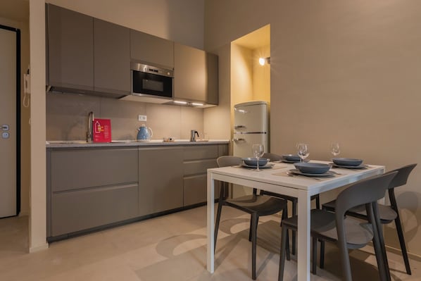 Apartment, 1 Double Bed with Sofa bed, Balcony | Private kitchen | Fridge, microwave, stovetop, dishwasher