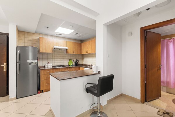 Apartamento clássico, 1 quarto, vista para a cidade | Cozinha privada | Chaleira elétrica, panela elétrica de arroz
