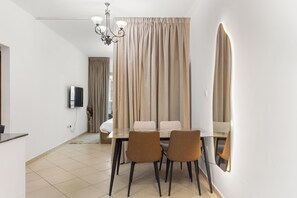 Classic Apartment, 1 Bedroom, City View | Dining room