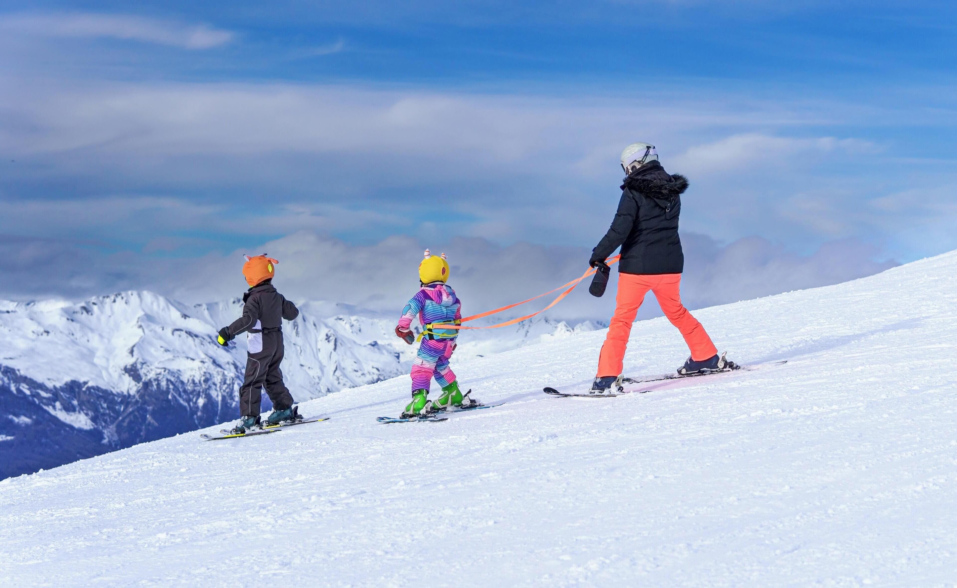 A snowy mountain landscape with a clear sky.