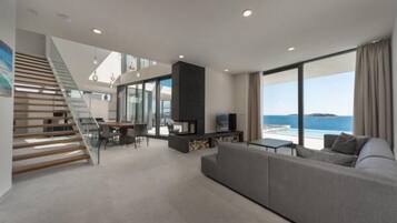 Smart TV, fireplace, foosball