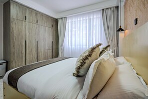 2 habitaciones, tabla de planchar con plancha, wifi y ropa de cama 