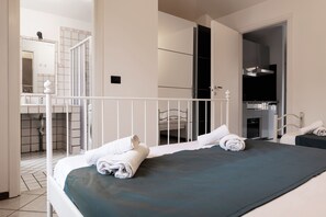 Apartment, 1 Bedroom, City View | Premium bedding, memory foam beds, in-room safe, desk - Turati Apartments (Bologna)