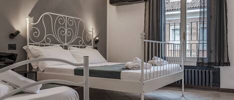 Apartment, 1 Bedroom, City View | Premium bedding, memory foam beds, in-room safe, desk