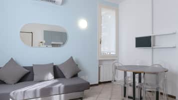 Departamento, vista a la ciudad | Área de sala de estar