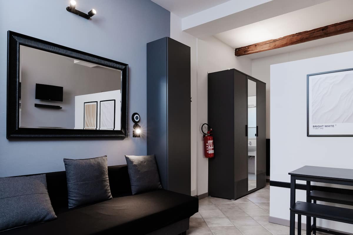 Apartment, Patio, City View | Living area | 37-inch LCD TV with digital channels