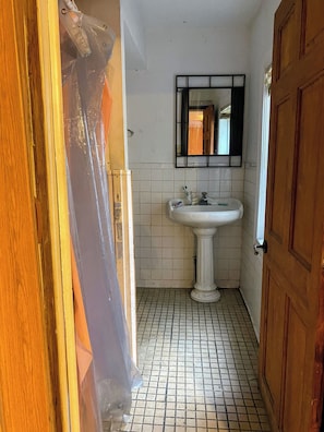 Shower, towels, soap, toilet paper