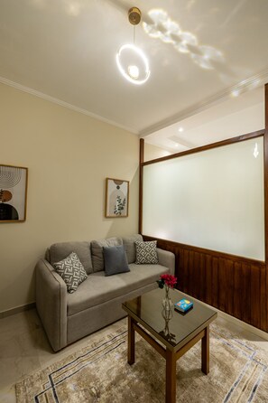 Deluxe Studio, City View | Living area - Welhome Stays (New Cairo)
