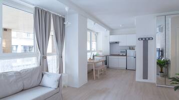 Apartment, City View | Living area | TV