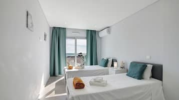 2 habitaciones, tabla de planchar con plancha, wifi y ropa de cama