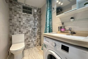 Hair dryer, towels, soap, toilet paper