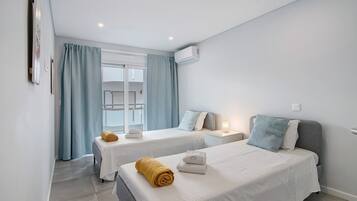 2 habitaciones, tabla de planchar con plancha, wifi y ropa de cama