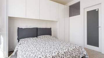 Apartment, City View | In-room safe, blackout curtains, soundproofing, iron/ironing board