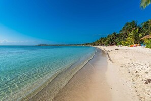 On the beach, sun-loungers, beach towels