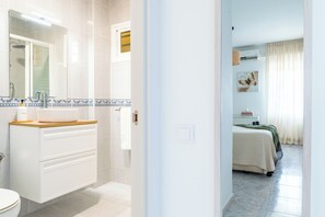 Hair dryer, towels, soap, toilet paper