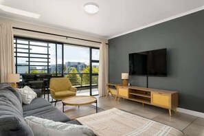 Apartment, Multiple Beds, Patio, Garden View (The Terraces ) | Living area | 42-inch flat-screen TV with digital channels