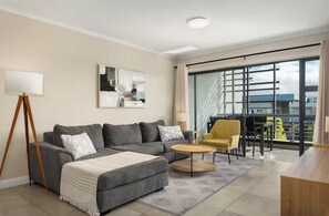 Appartement, plusieurs lits, patio, vue jardin (The Terraces ) | Coin séjour