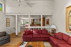 TV, fireplace, books