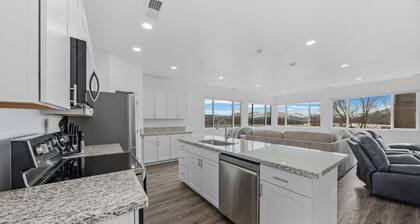 Brand-new 4-bed, 2-bath suite with stunning lake views.