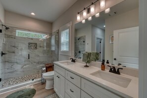 Shower, towels, soap, toilet paper