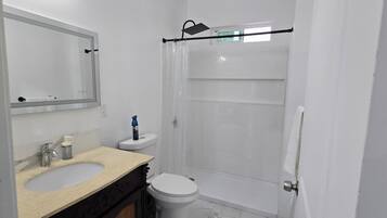 Hair dryer, towels, soap, toilet paper