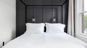 1 bedroom, desk, iron/ironing board, travel crib