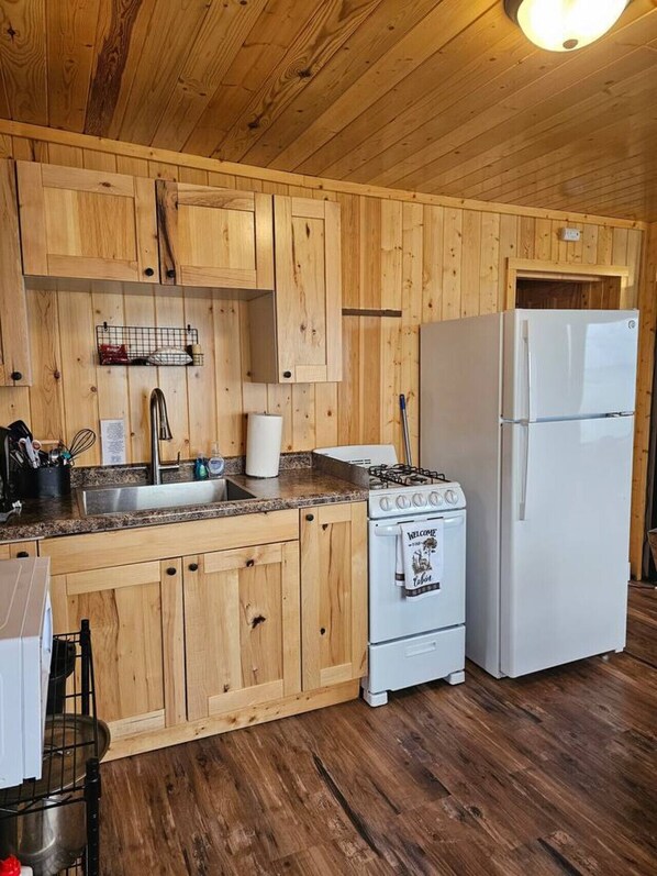 Fridge, microwave, oven, stovetop - Hillside Resort Cabin #3 (Phelps)