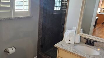 Hair dryer, towels, soap, toilet paper