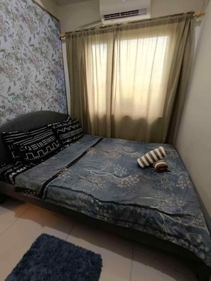 1 habitación y ropa de cama