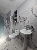 Shower, towels, soap, shampoo