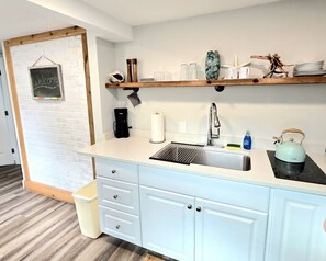 Fridge, microwave, stovetop, coffee/tea maker