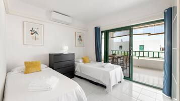 2 dormitorios, tabla de planchar con plancha, wifi y ropa de cama