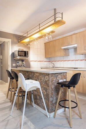 Microwave, stovetop, coffee/tea maker, toaster