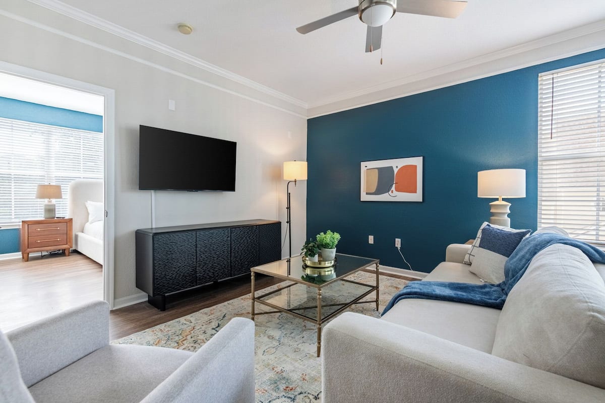 Standard Apartment, 2 Bedrooms | Living area | 50-inch TV with digital channels
