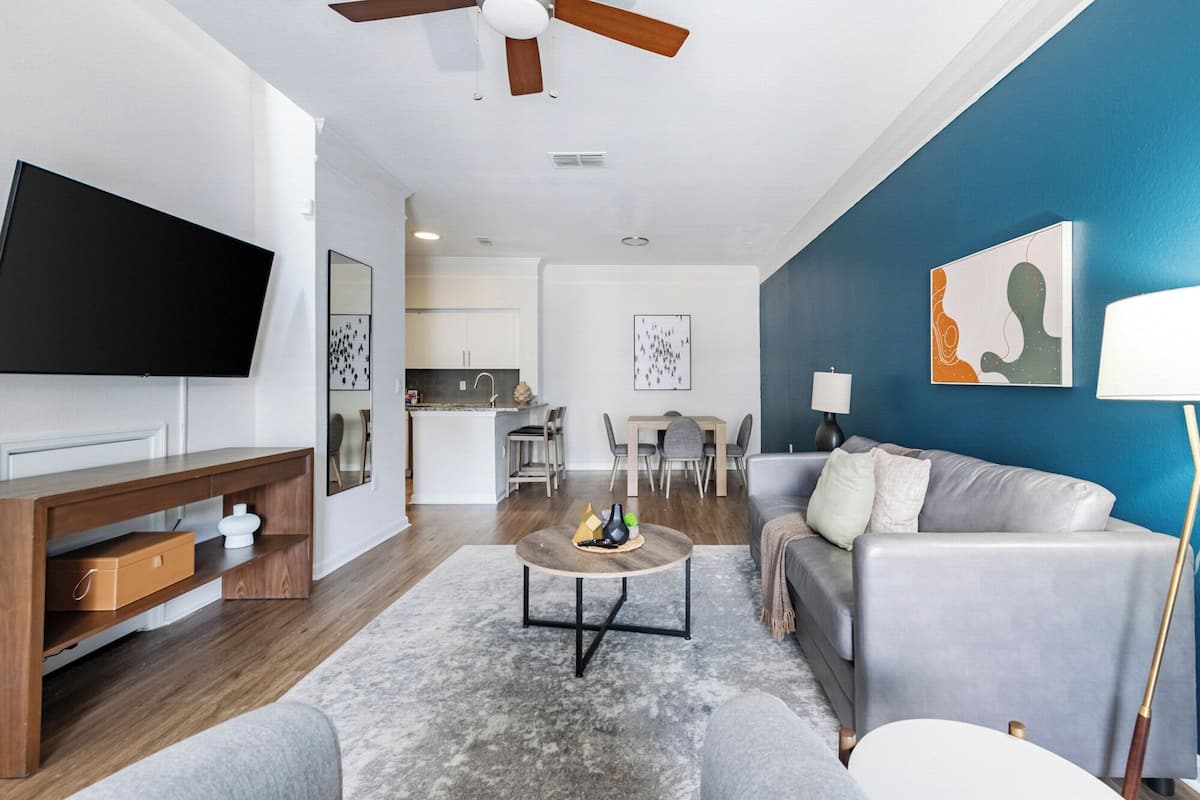 Apartment, 2 Bedrooms | Living area | 50-inch TV with digital channels