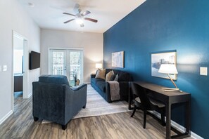 Apartment, 1 Bedroom | Living area | 50-inch TV with digital channels - Landing Apartments - University City North (Charlotte)
