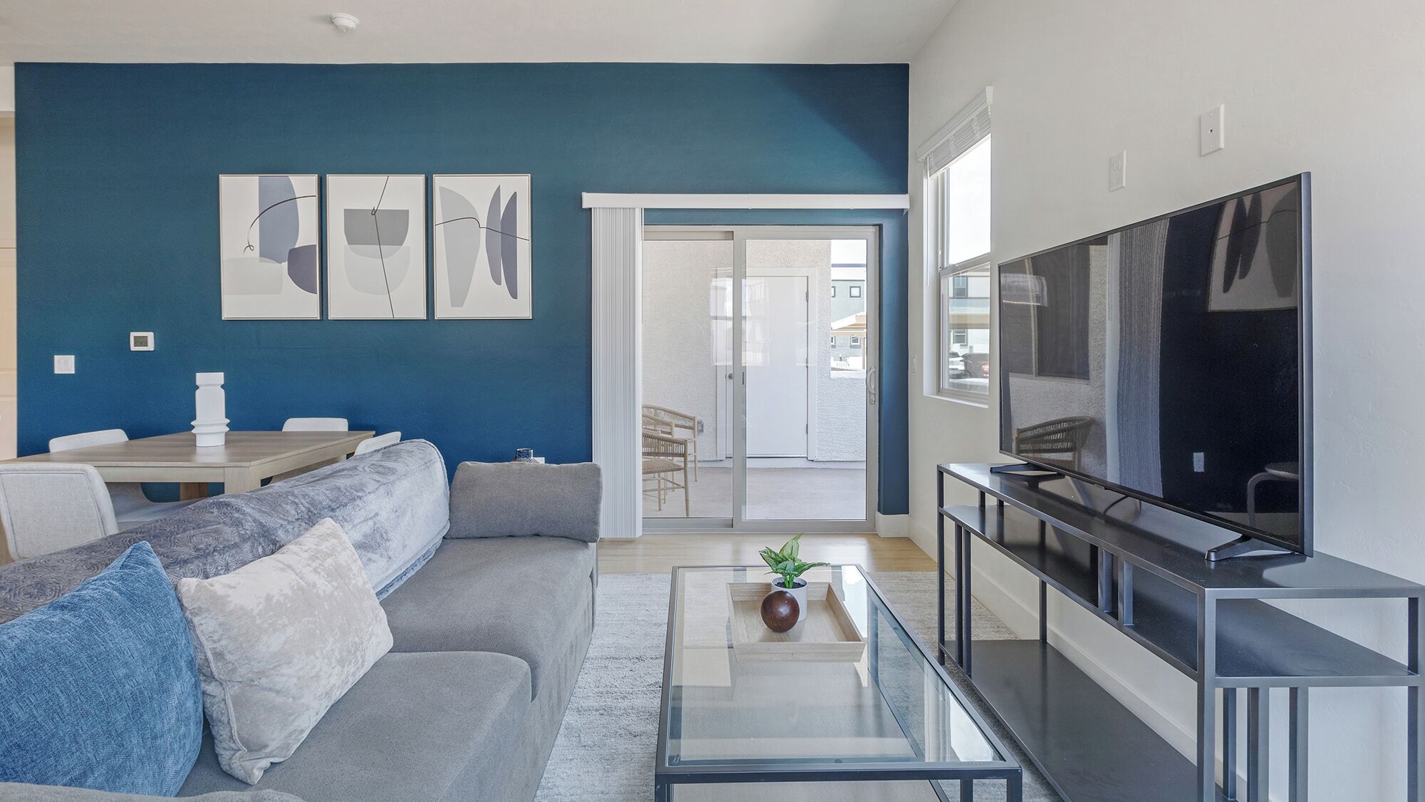 Apartment, 1 Bedroom | Living area | 50-inch TV with digital channels