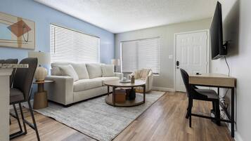 Apartment, 1 Bedroom | Living area | TV