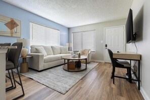 Apartment, 1 Bedroom | Living area | TV