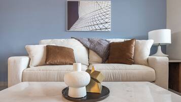 Apartment, 2 Bedrooms | Living room | 50-inch TV with digital channels